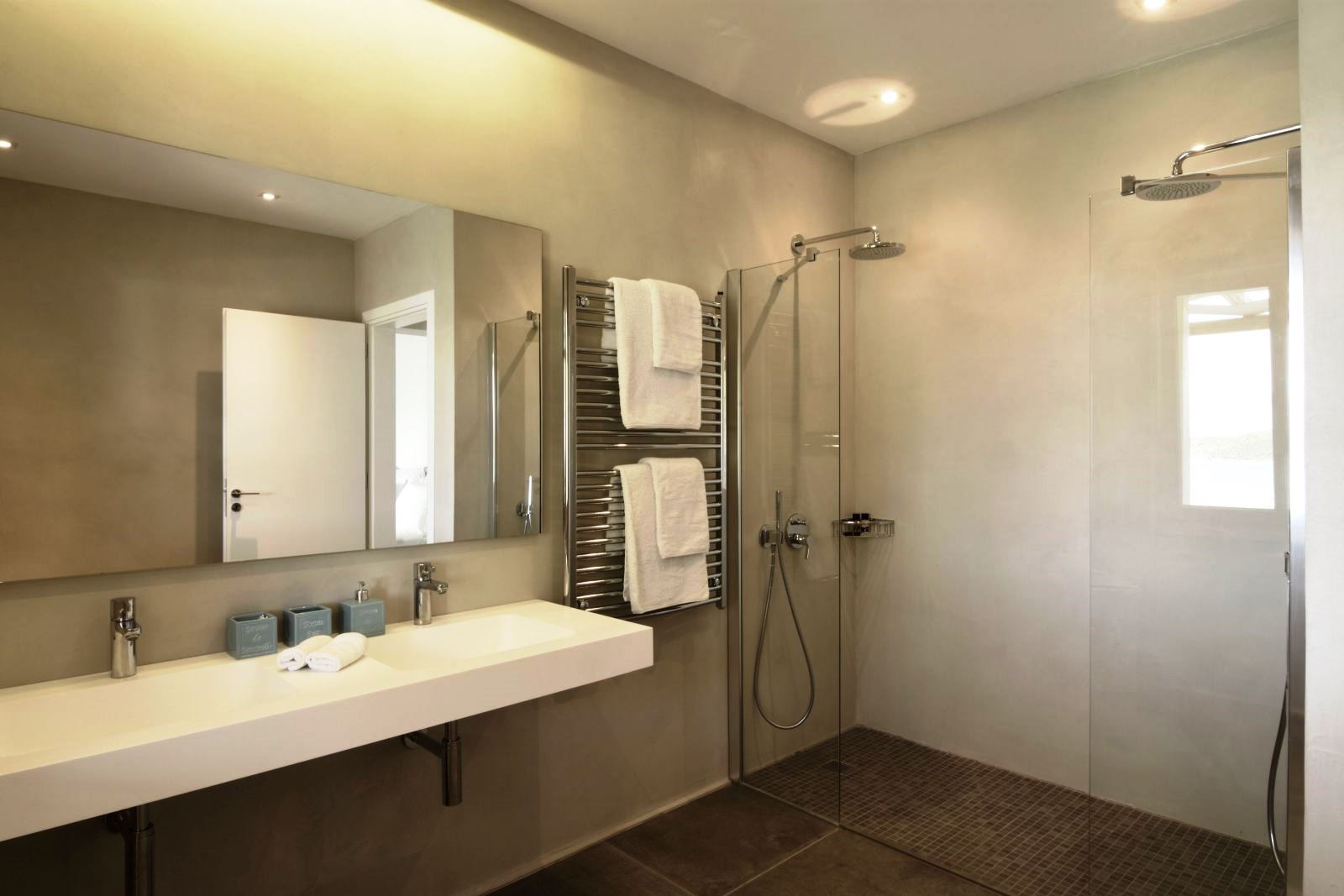 Bathroom with walk in shower and double sinks at villa eleni in corfu, Greece