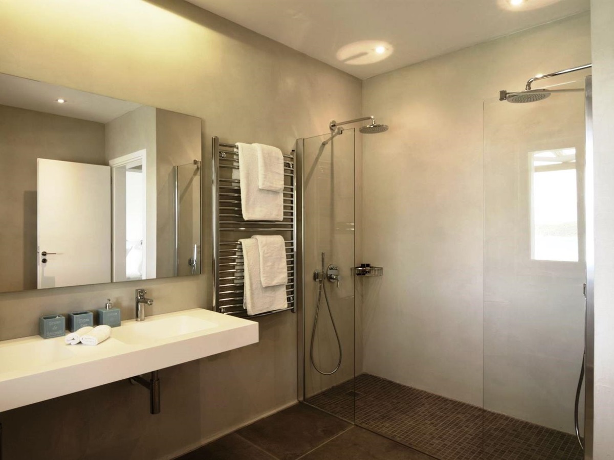 Bathroom with walk in shower and double sinks at villa eleni in corfu, Greece