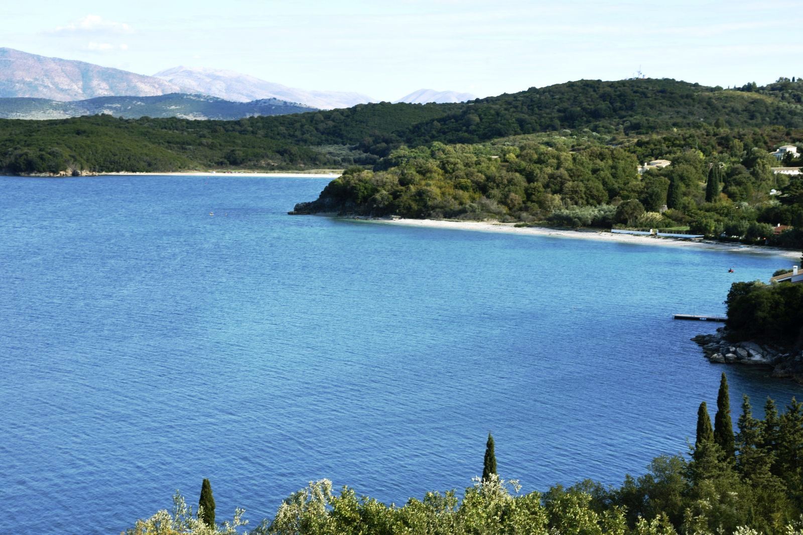 Panoramic view over the sea with hills in the background at villa eleni in corfu, Greece
