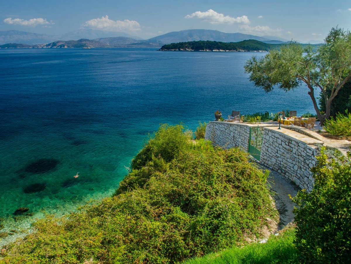 View of the sea and outdoor seating at Villa Elia, Corfu