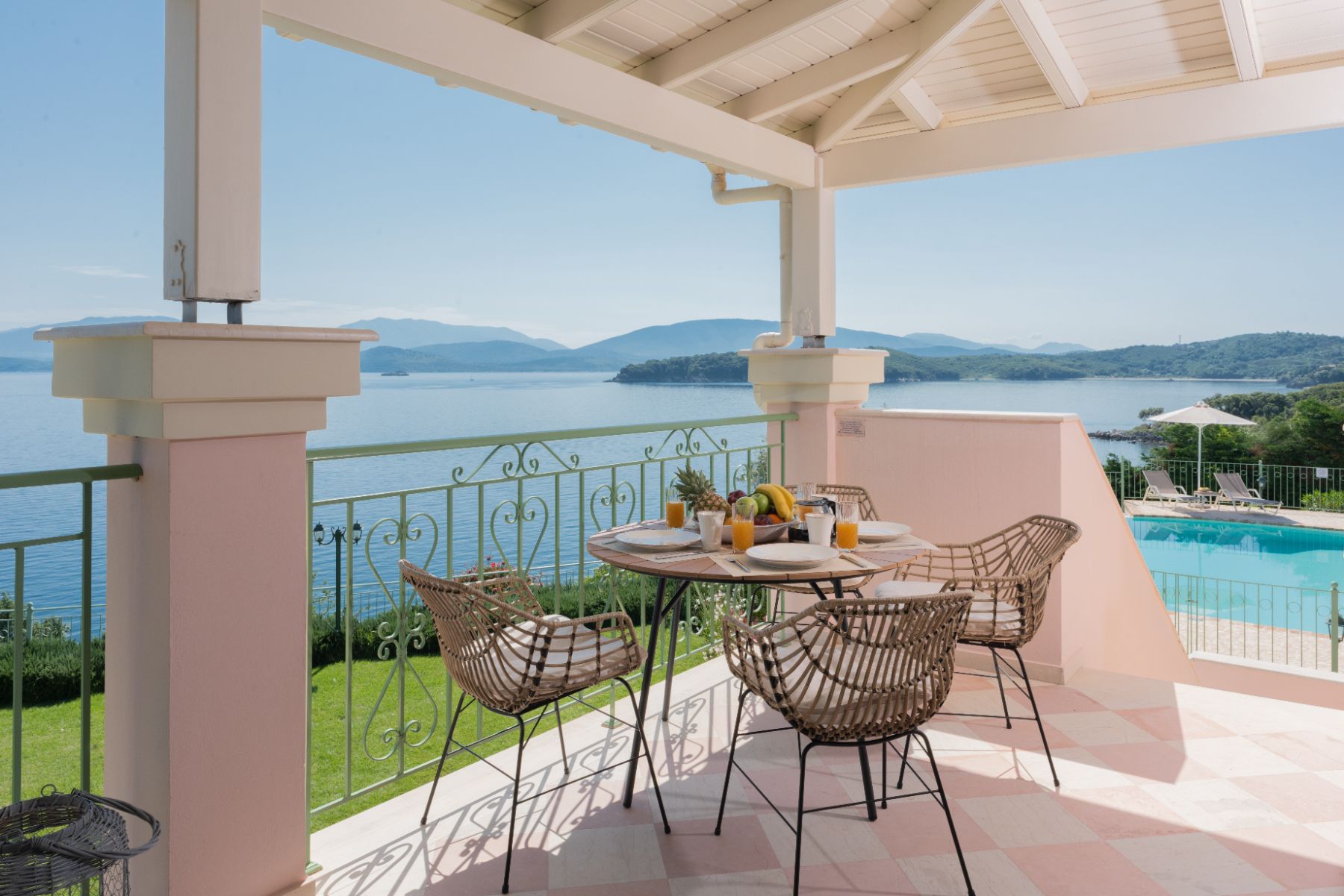 Terrace with seating and sea views at Villa Elia, Corfu