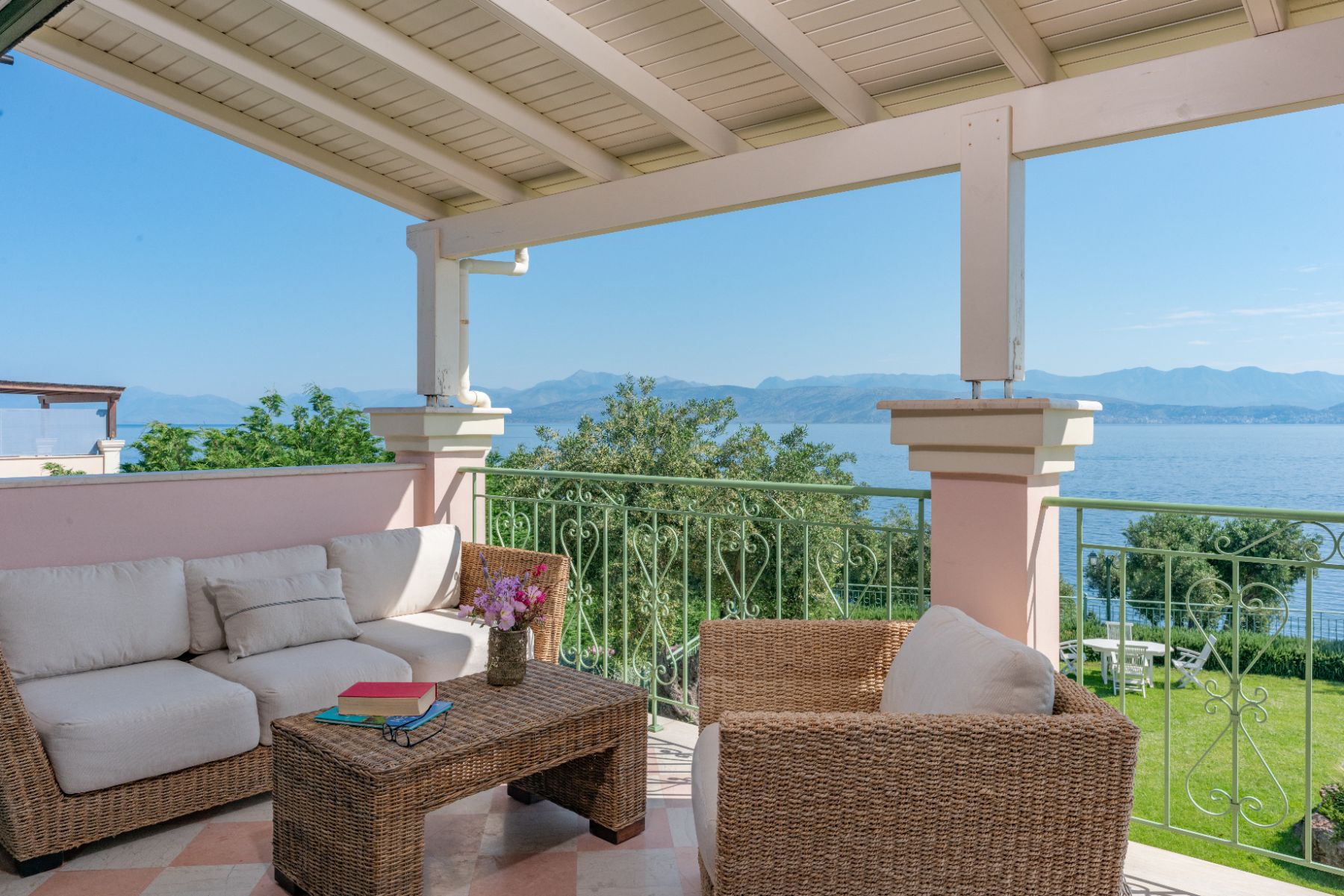 Terrace with seating and sea views at Villa Elia, Corfu