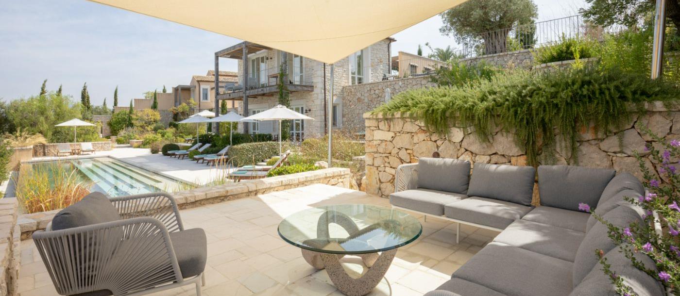 Covered terrace with seating at Villa Epirus