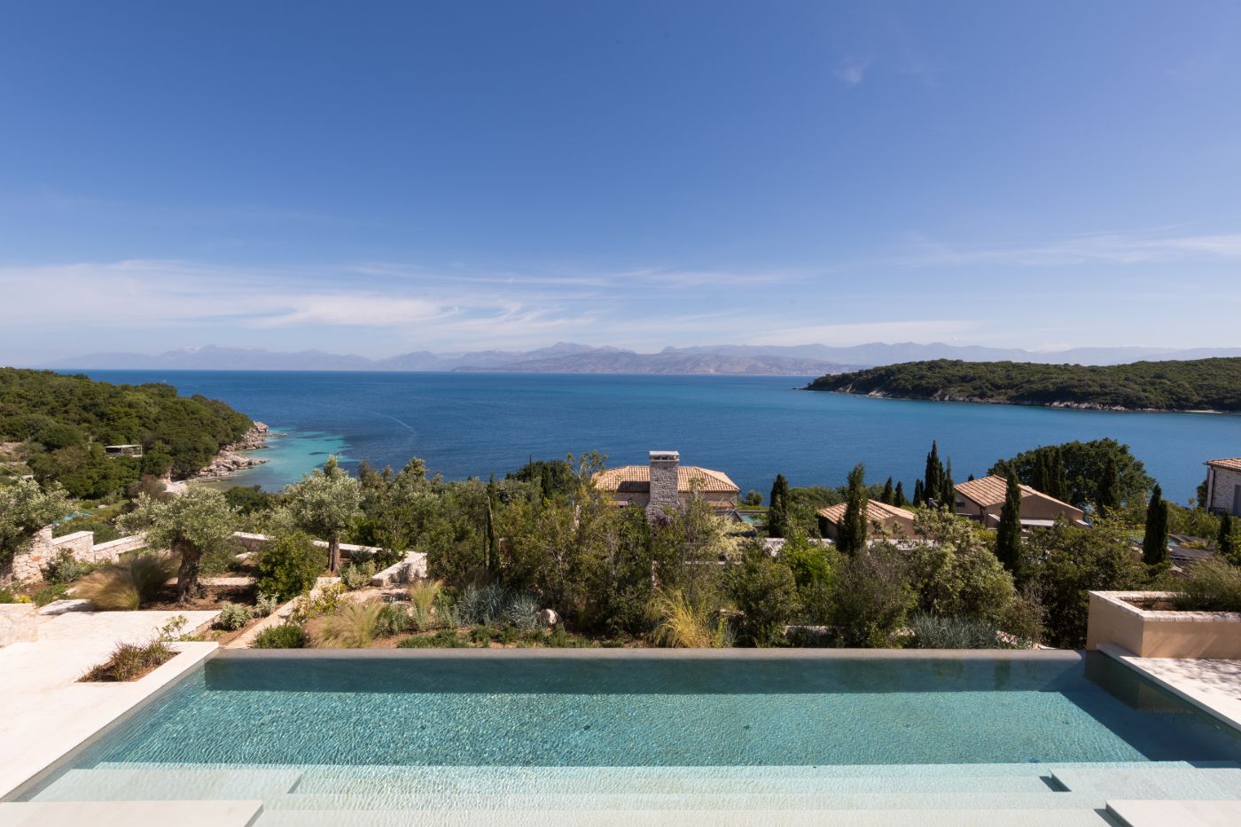 View of the pool and coastline from Villa Epirus