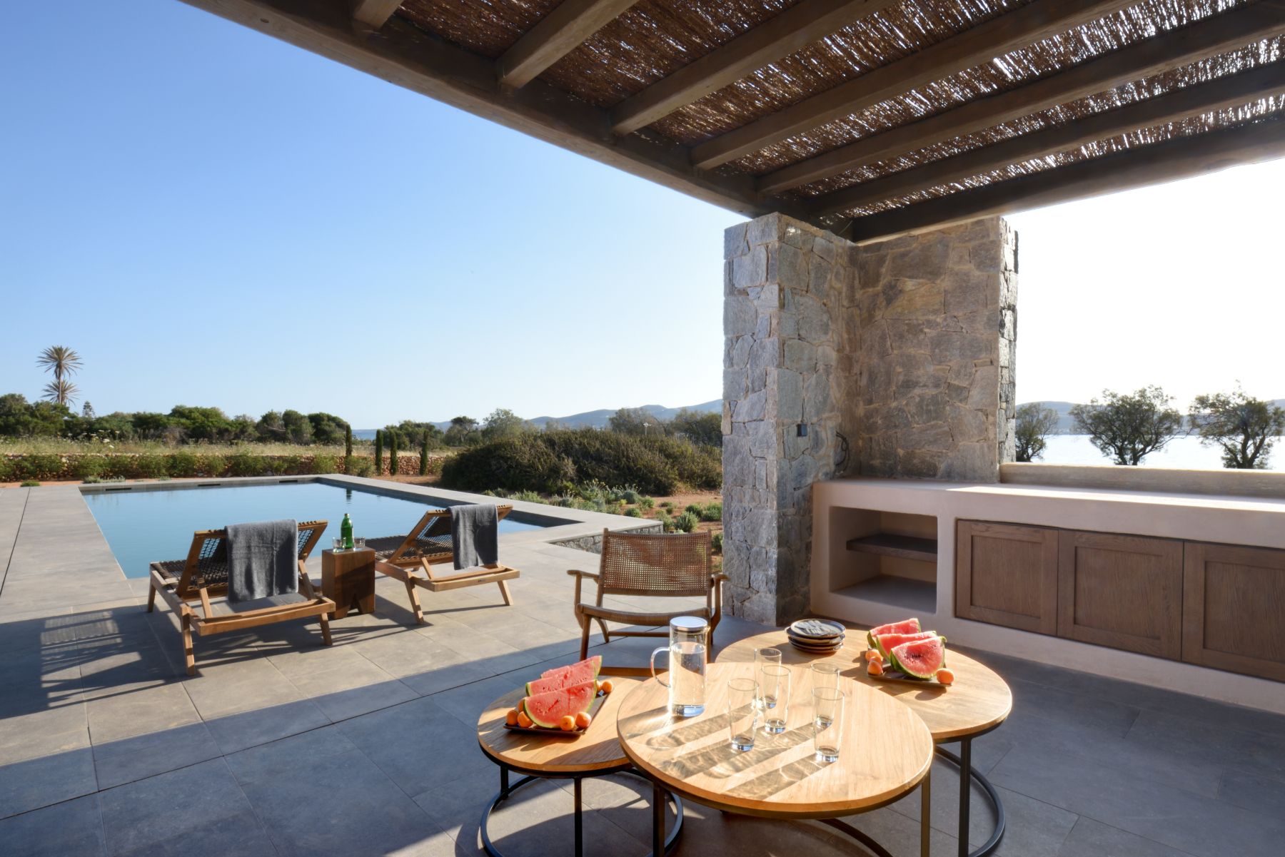 Pool and outdoor kitchen at Villa Galini, Paros