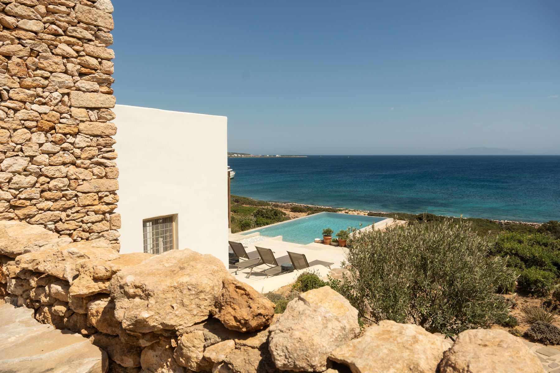 View of pool and sea at Villa Ilios, Paros