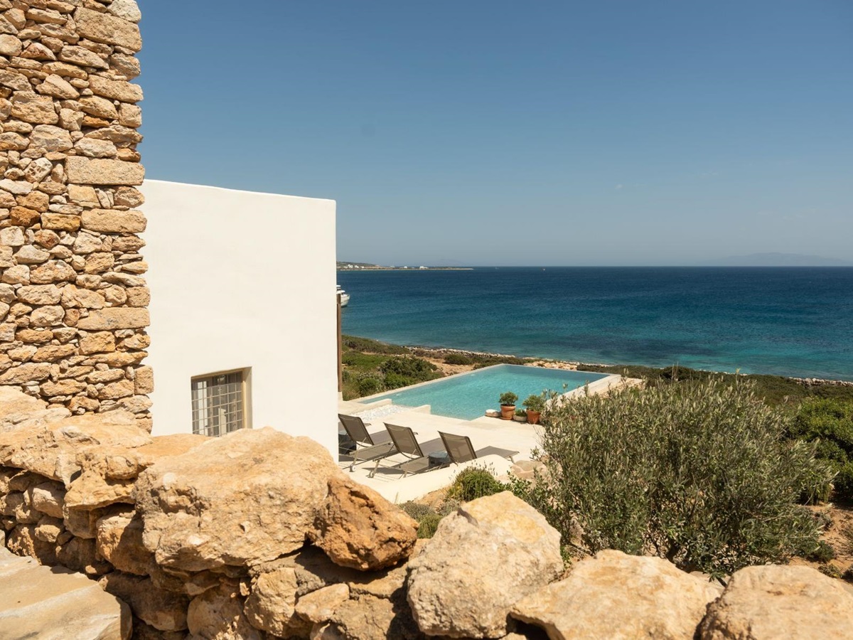 View of pool and sea at Villa Ilios, Paros