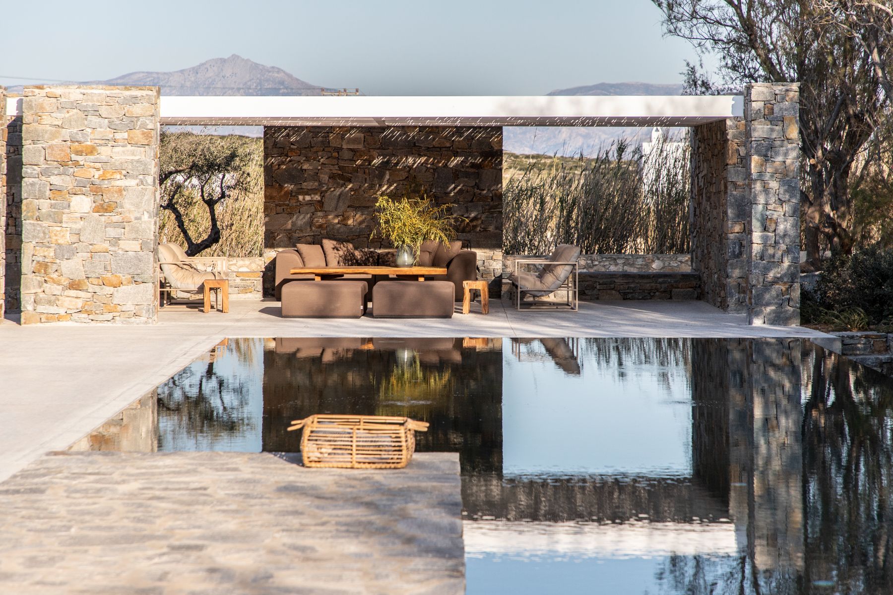 Pool with seating area at Villa Irida, Paros