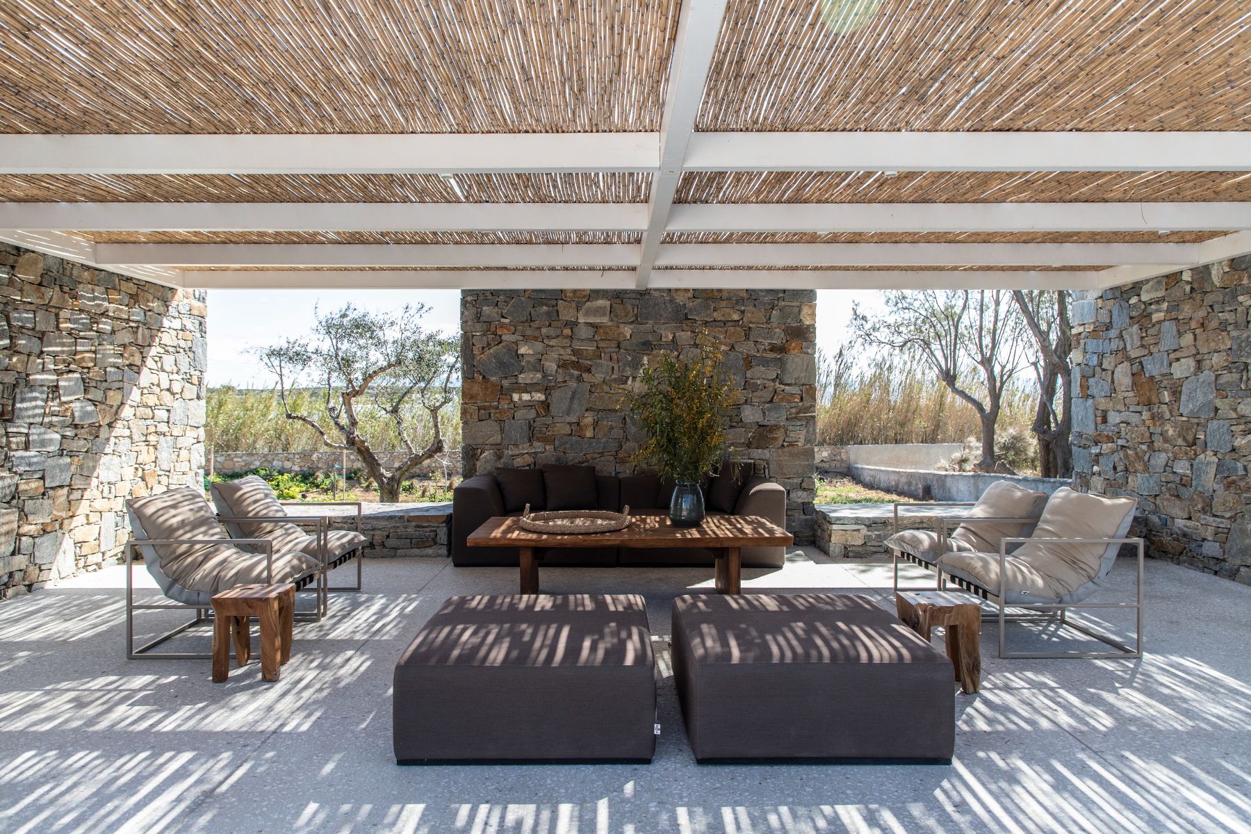 Covered terrace with seating at Villa Irida, Paros