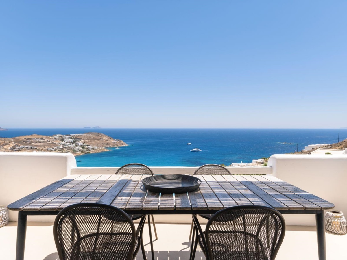 Outdoor seating with sea view at Villa Kallos, Mykonos