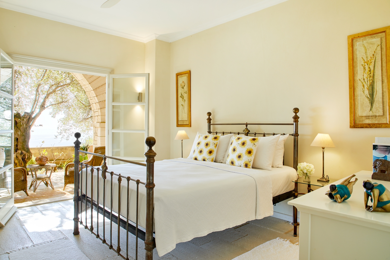 Double bedroom with door to terrace at Villa Kerasia in Corfu