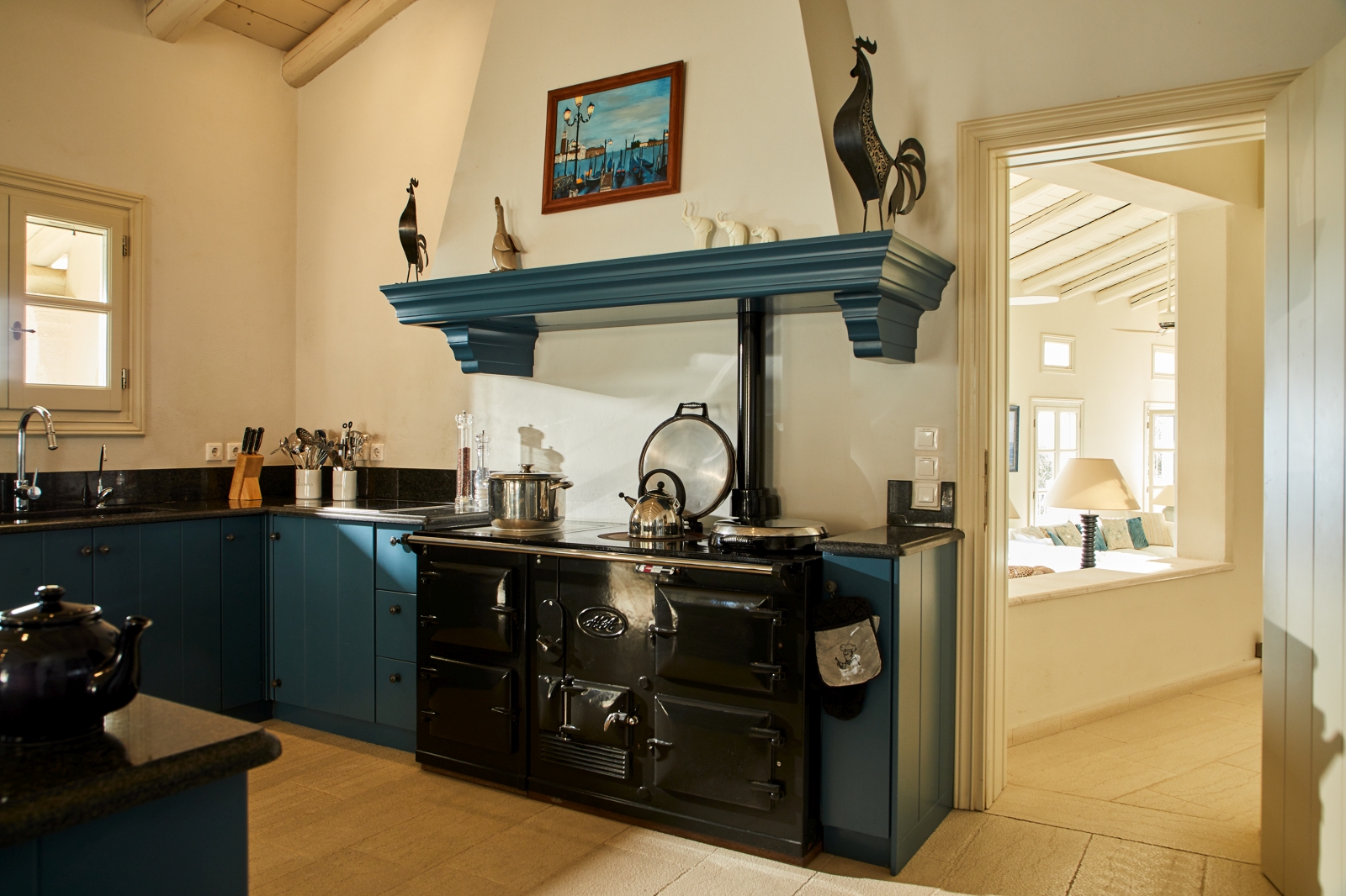 Kitchen with blue cabinets at Villa Kerasia in Corfu