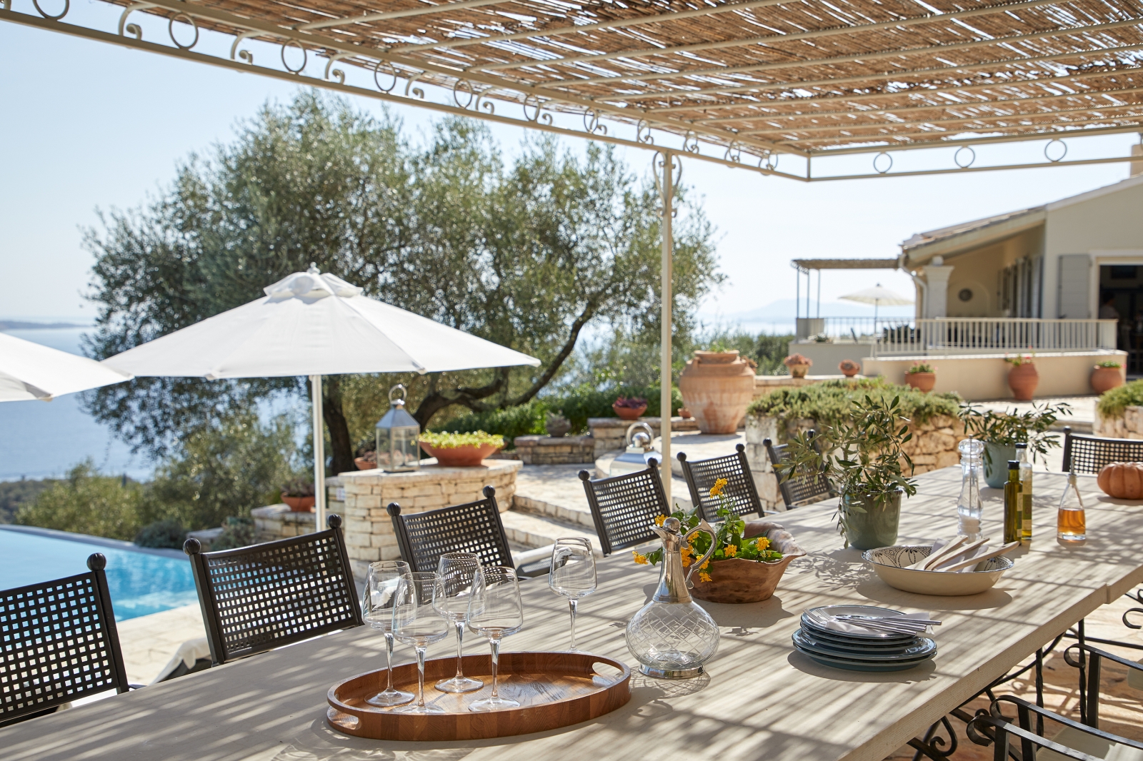 Outdoor dining laid for lunch at Villa Kerasia in Corfu