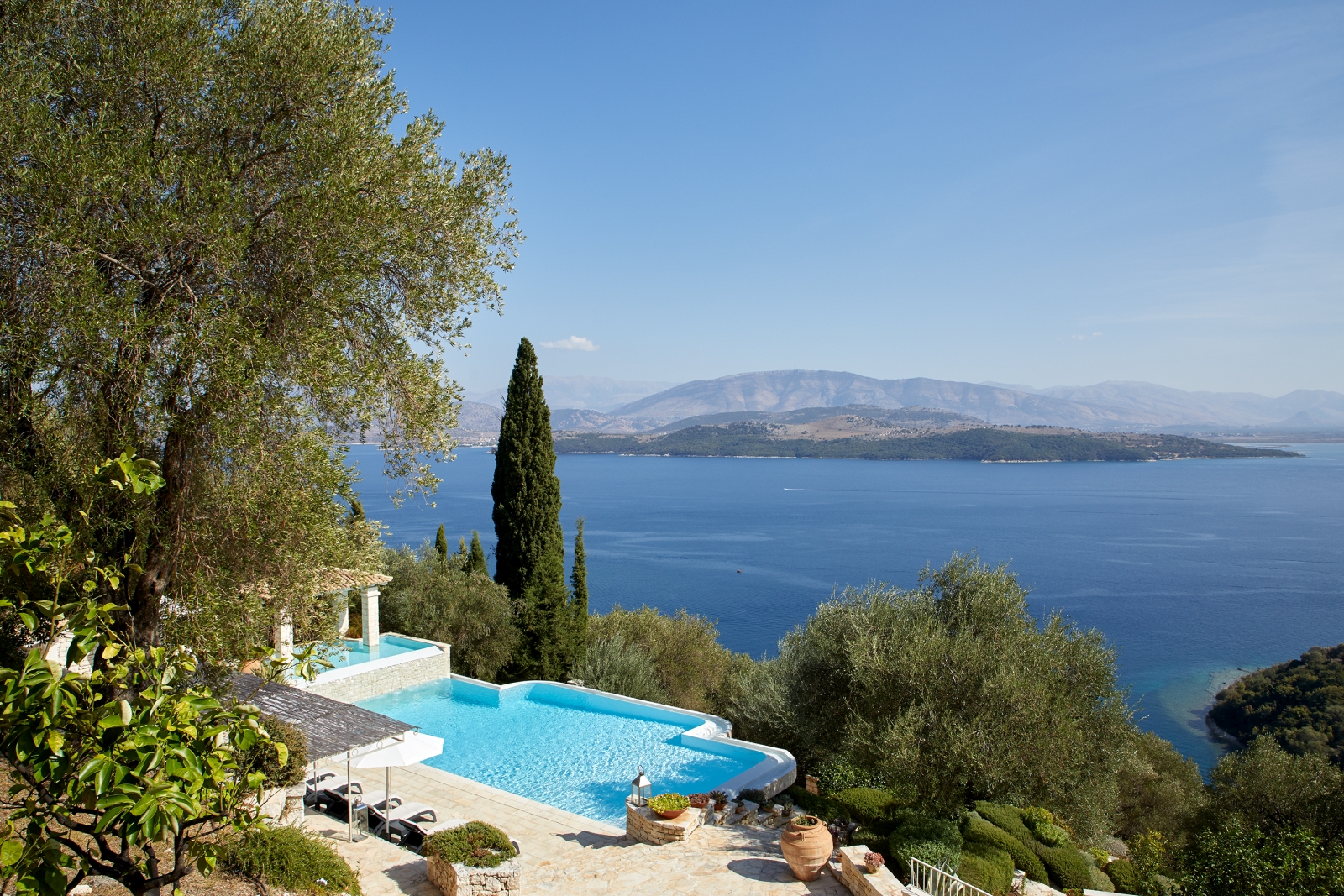 Pool with view towards islands and sea at Villa Kerasia in Corfu