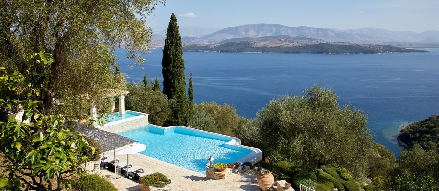 Pool with view towards islands and sea at Villa Kerasia in Corfu