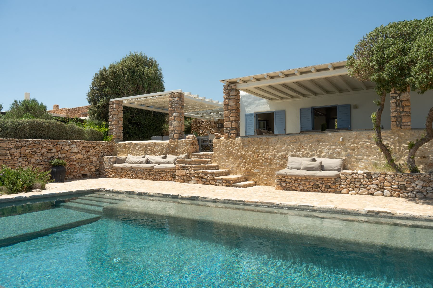 Pool with seating at Villa Kymata, Paros