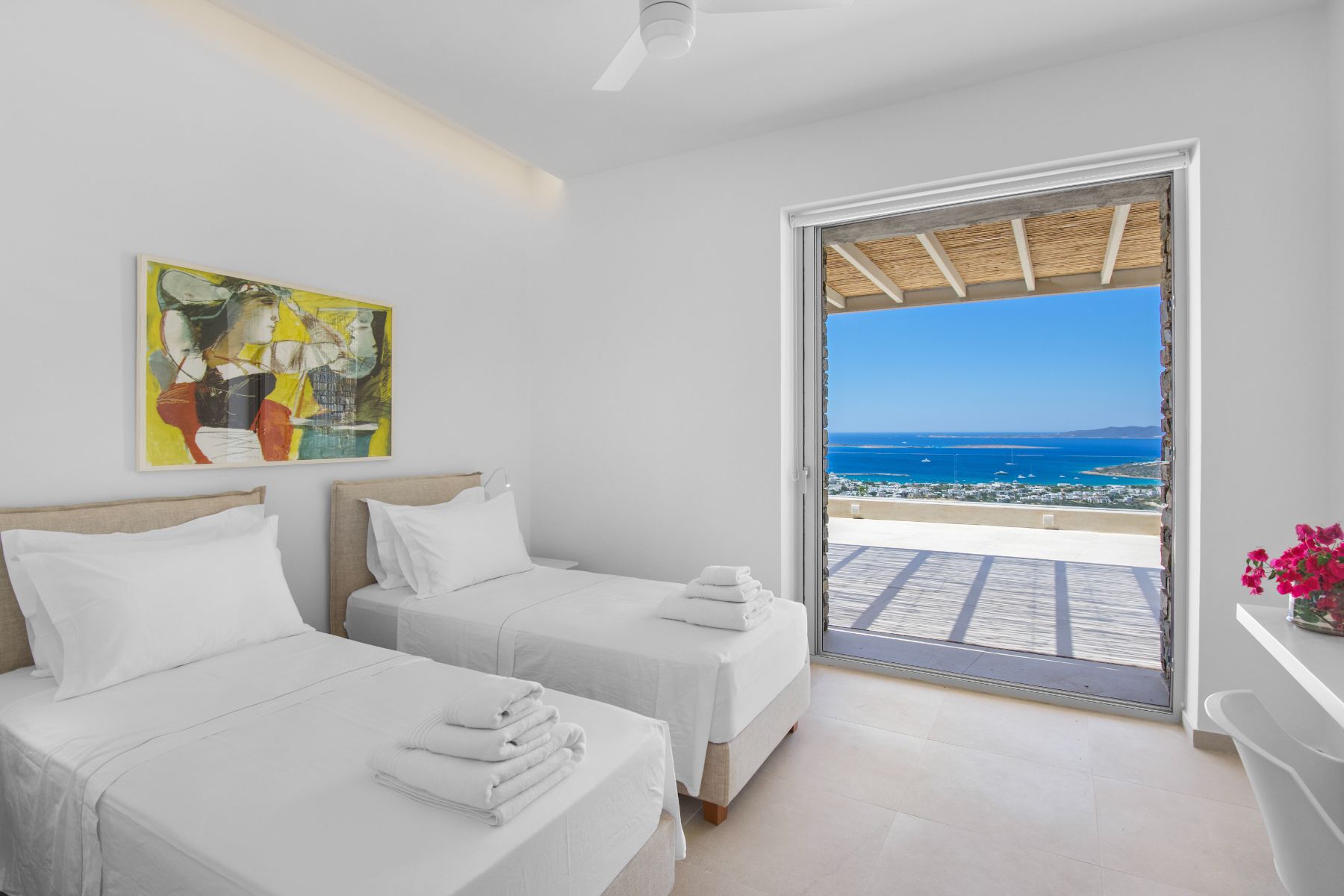 Twin bedroom with sea view at Villa Lara, Paros