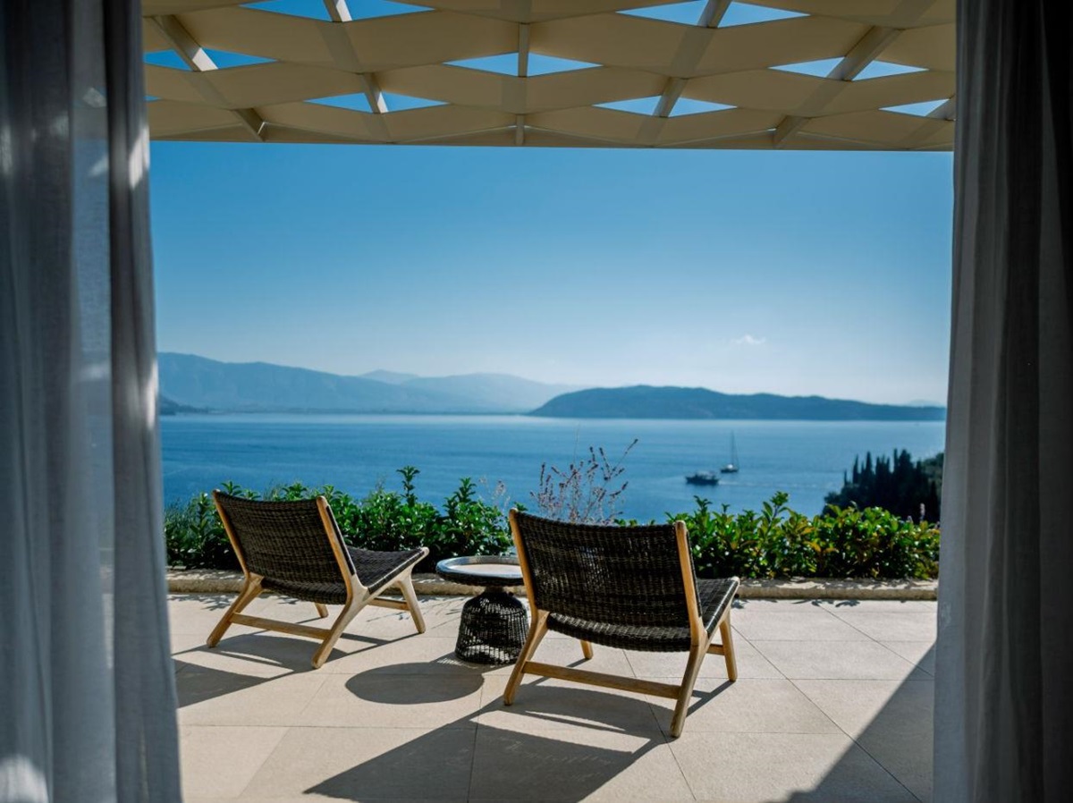 Balcony with sun loungers at Villa Leonidas