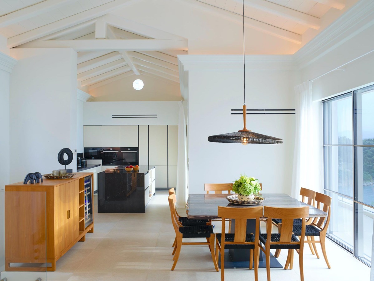 Dining area and kitchen at Villa Leonidas