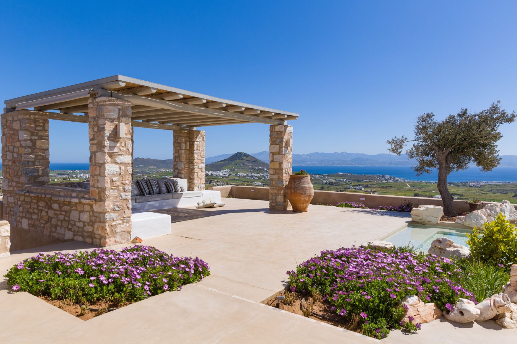 Covered outdoor seating at Villa Livadi, Paros