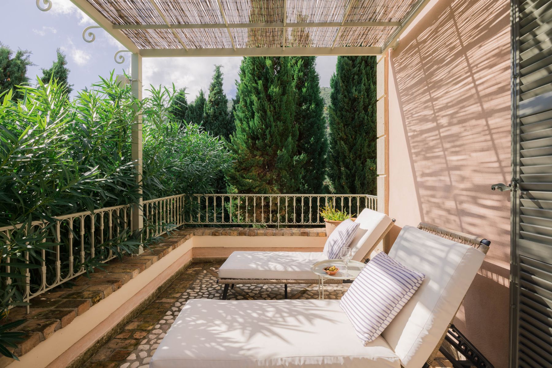 Terrace with sun loungers at Villa Mareas, Corfu