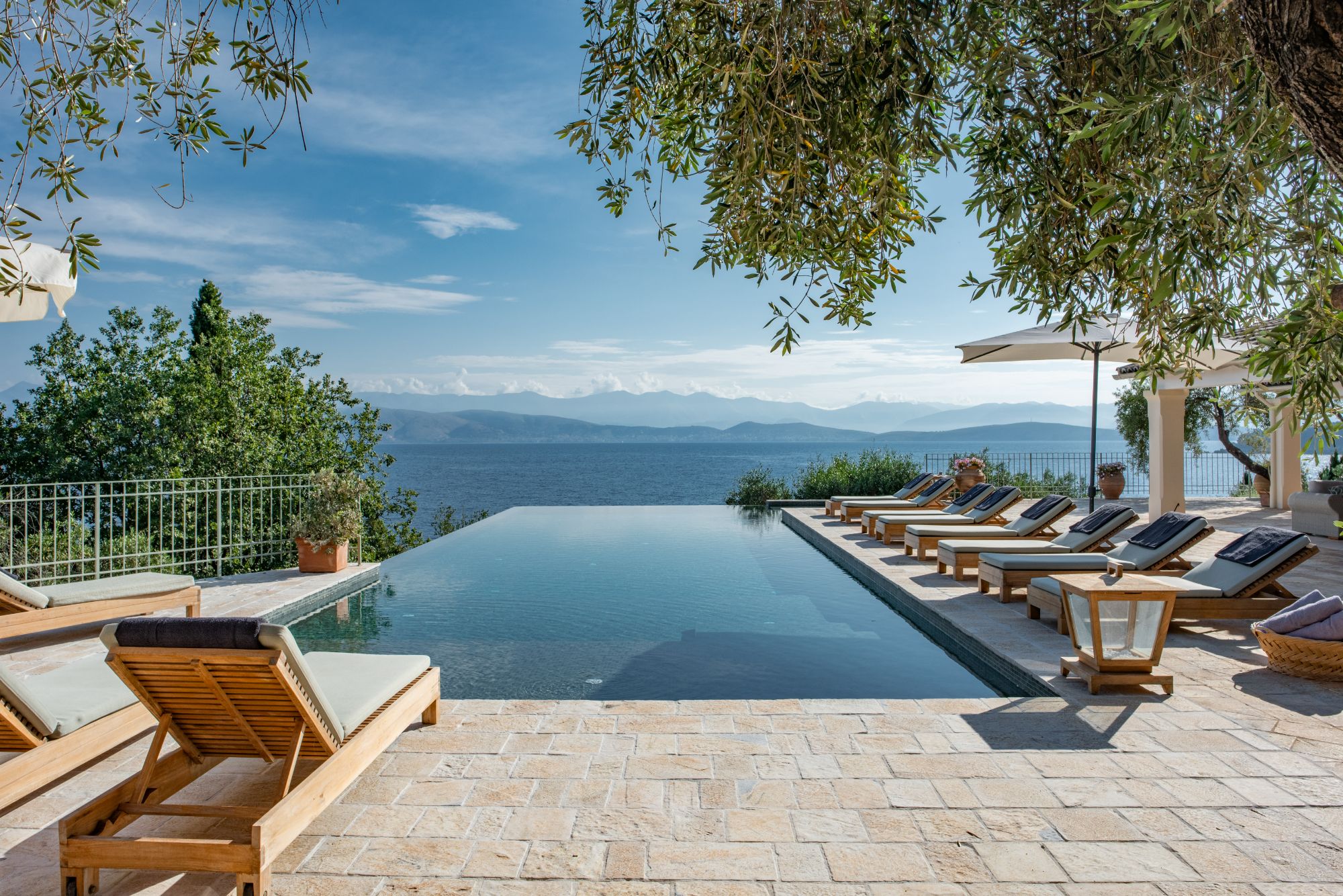 Pool with loungers at Villa Ophelia