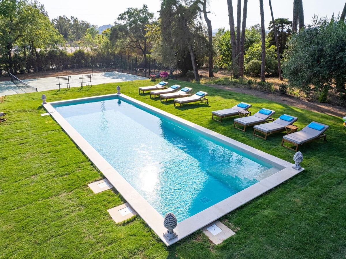 Pool and sun loungers at Villa Posillipo, Corfu