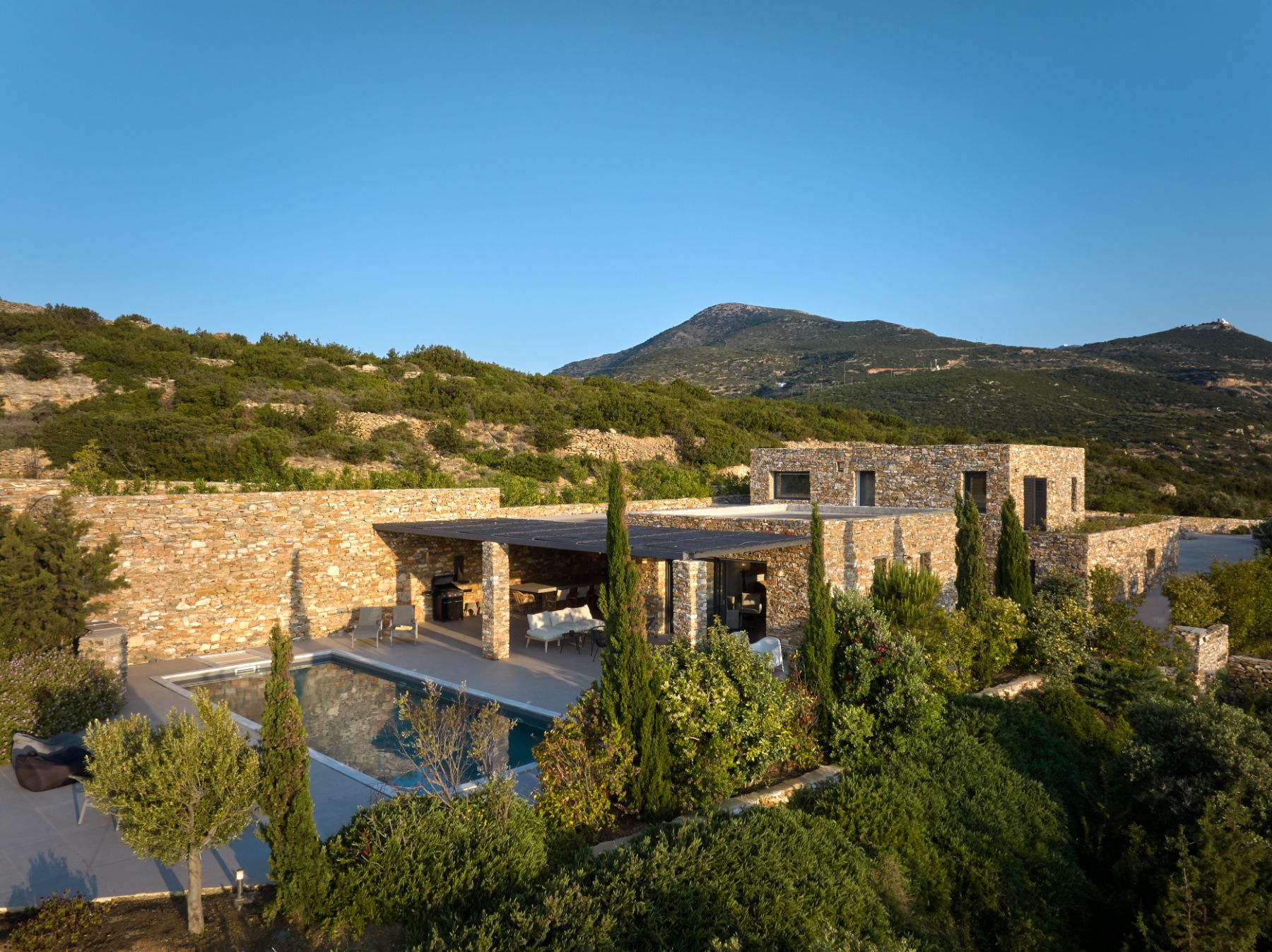 View of Villa Thalia, Sifnos with mountains in the background