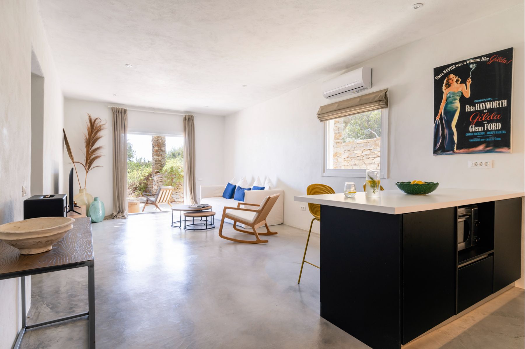 Kitchenette with open plan living and dining area at Villa Thalia, Sifnos