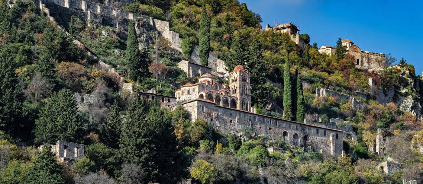 View of the Pantanassa monastery on the side of a mountain