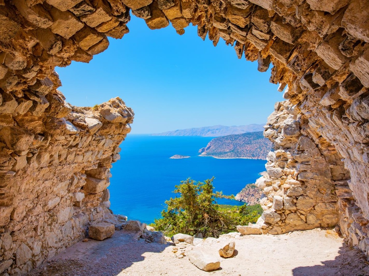 View from inside a brick tunnel towards the sea