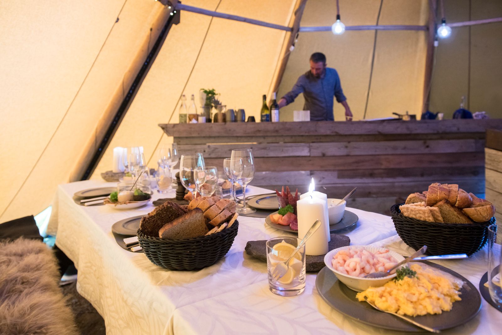 Meal times in the cosy dining tent at Camp Kiattua in Greenland