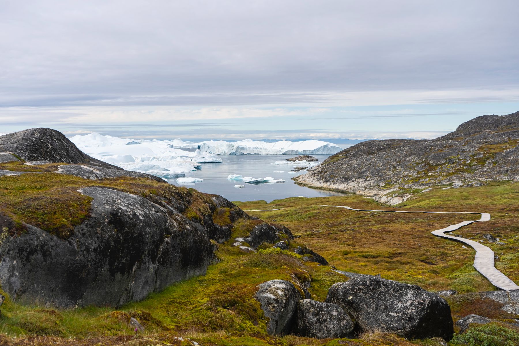 Boardwalk leading to an iceberg beach in Disko Bay Greenland