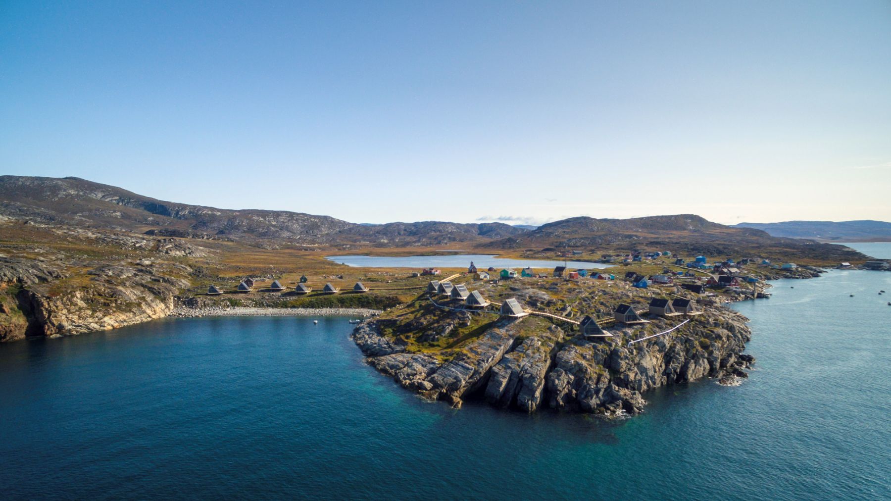 Bungalows and pristine coastline at Ilimanaq Lodge Greenland