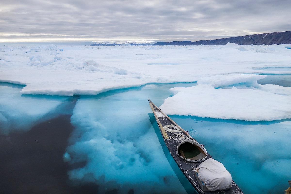 Kayaking in the waters of Kim Insuk in Greenland