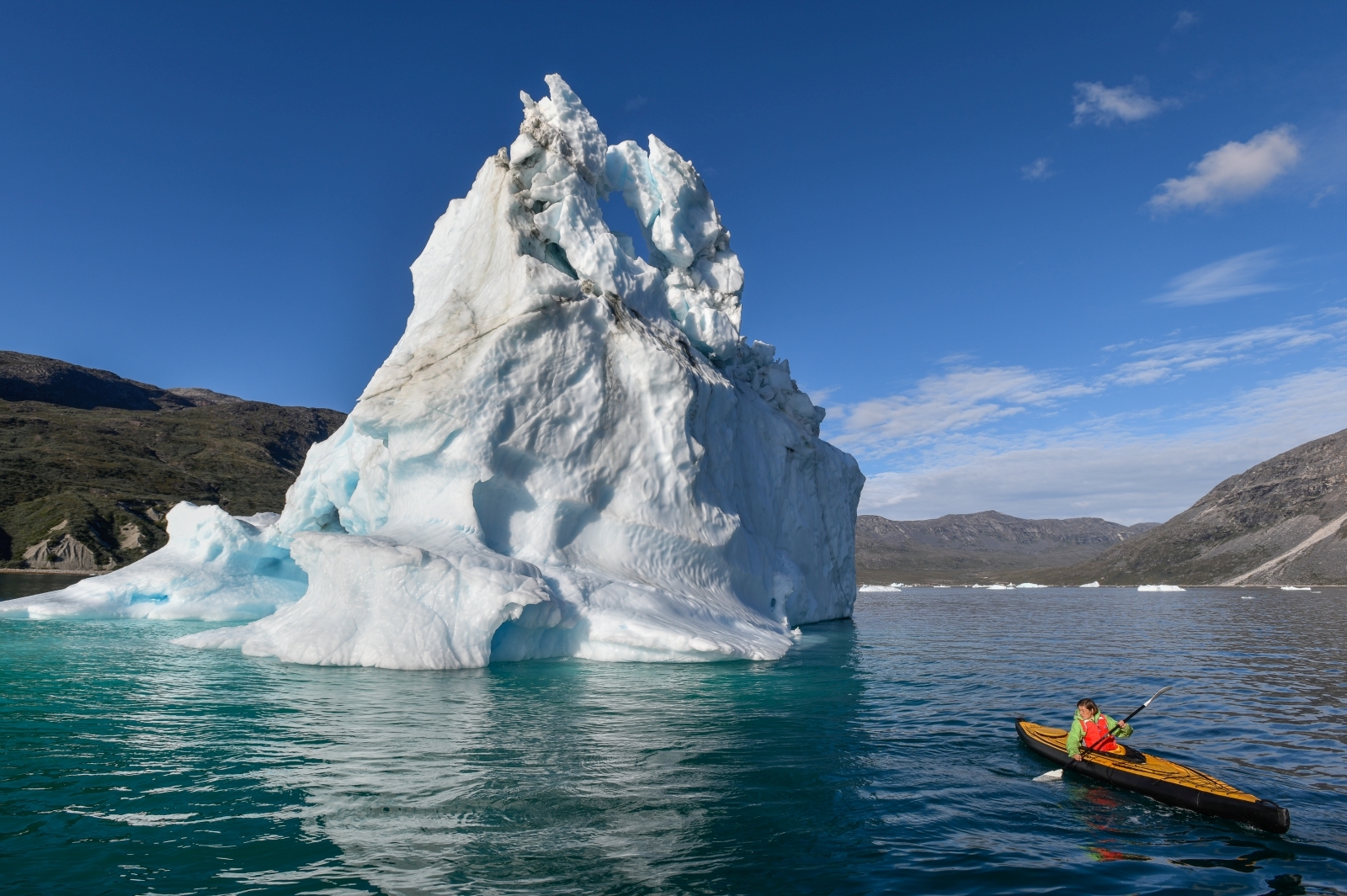 Kayaking by icebergs in Greenland