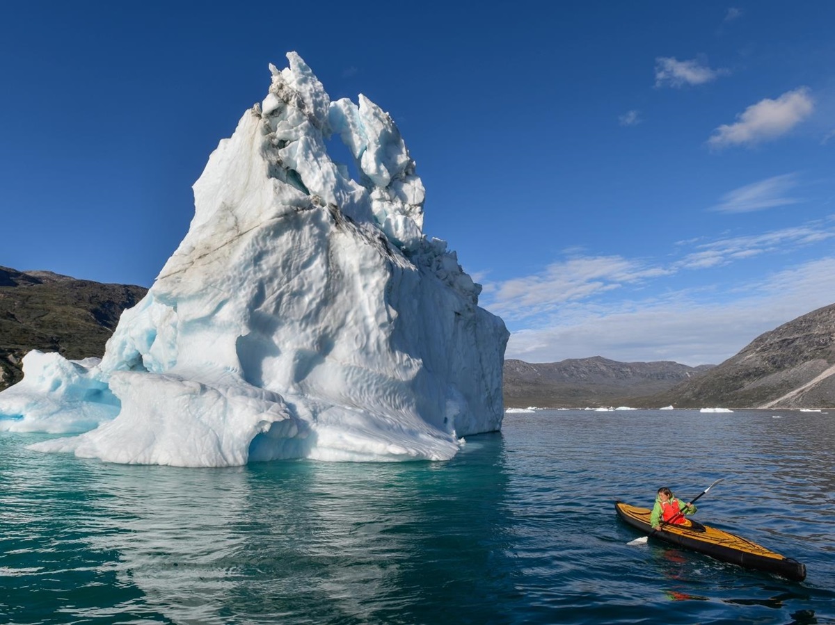 Kayaking by icebergs in Greenland