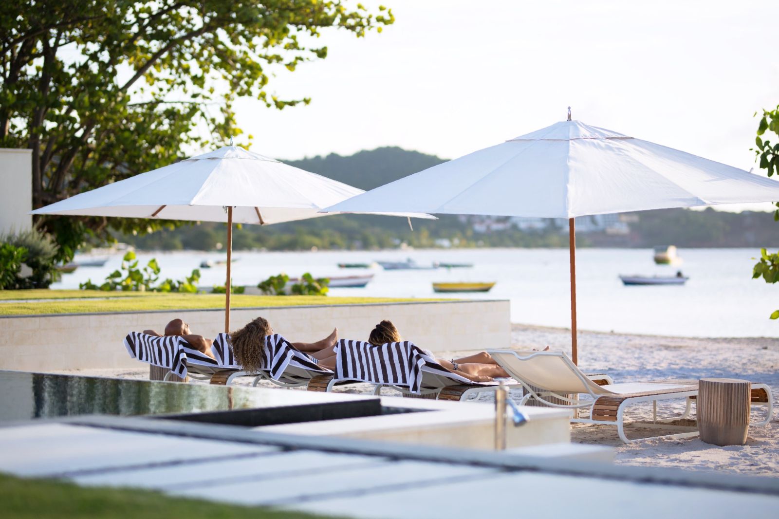 Guests enjoying the beach at Silversands hotel in Grenada