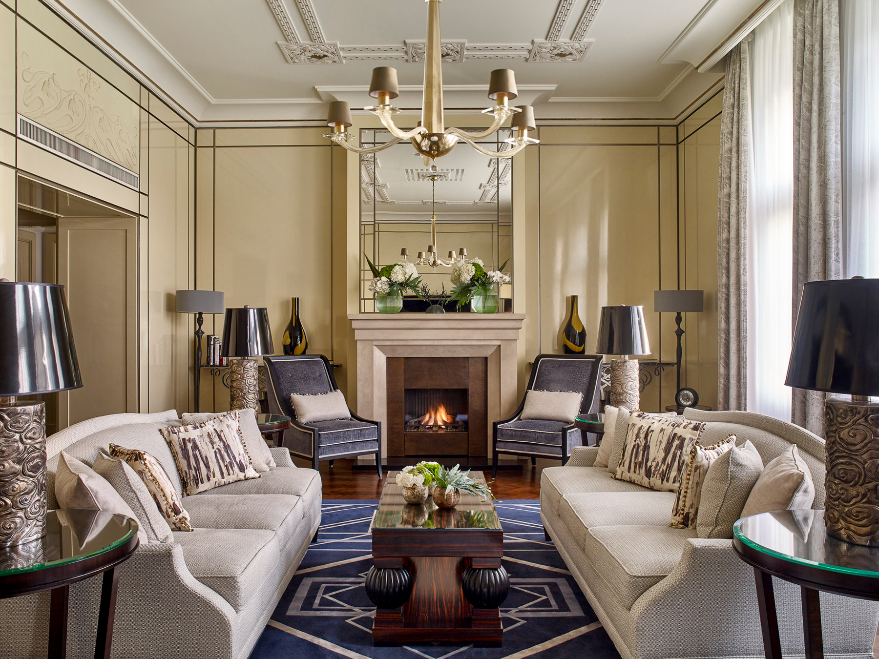 Lounge with fireplace at Four Seasons Gresham Palace in Budapest