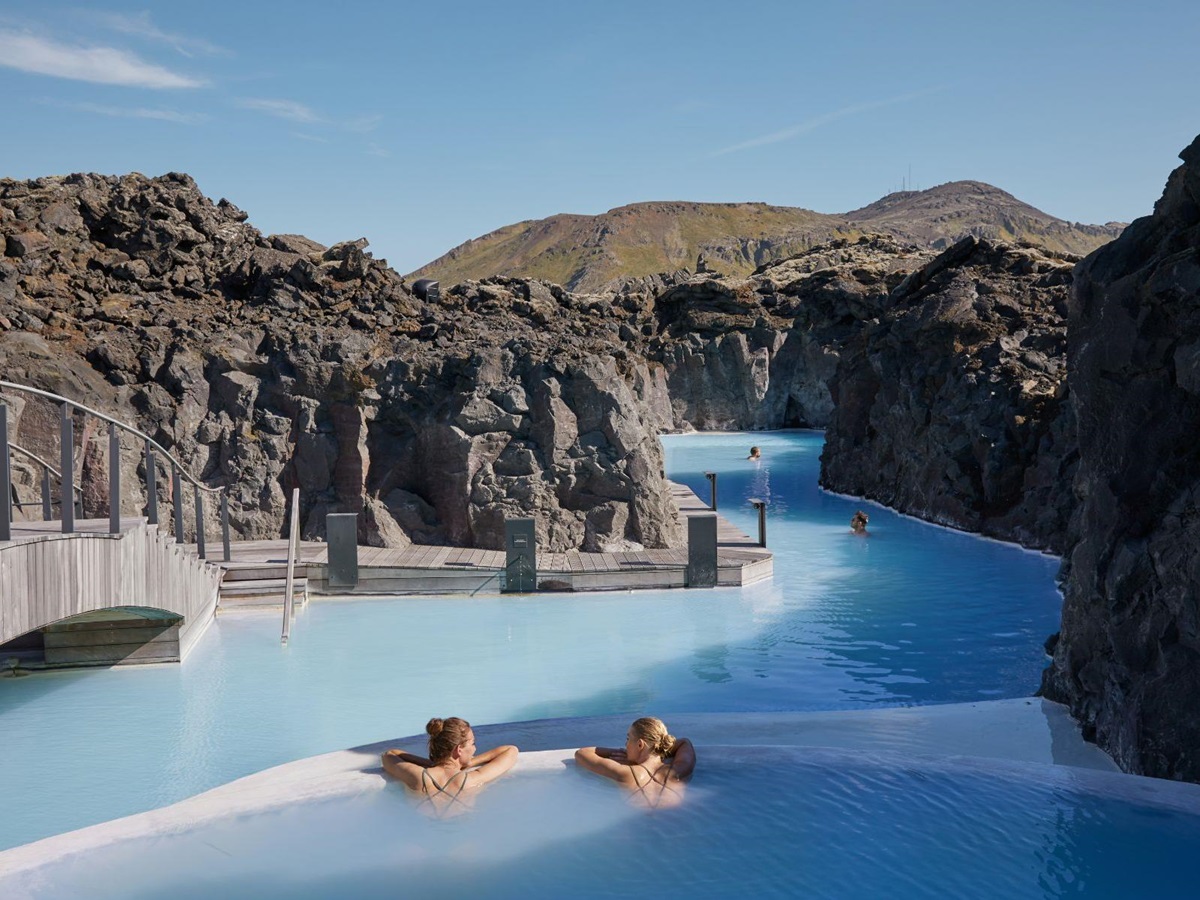 A couple soaking in the private Retreat section of the Blue Lagoon in Iceland