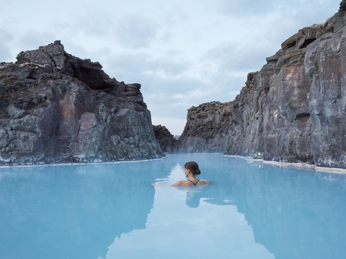 A lady soaking in the private thermal waters of The Retreat at the Blue Lagoon in Iceland