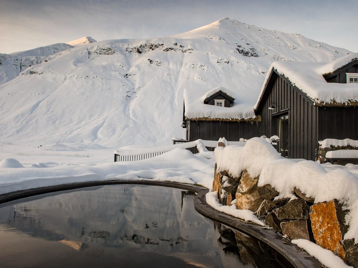 Swimming pool during the snow at Deplar Farm in Iceland