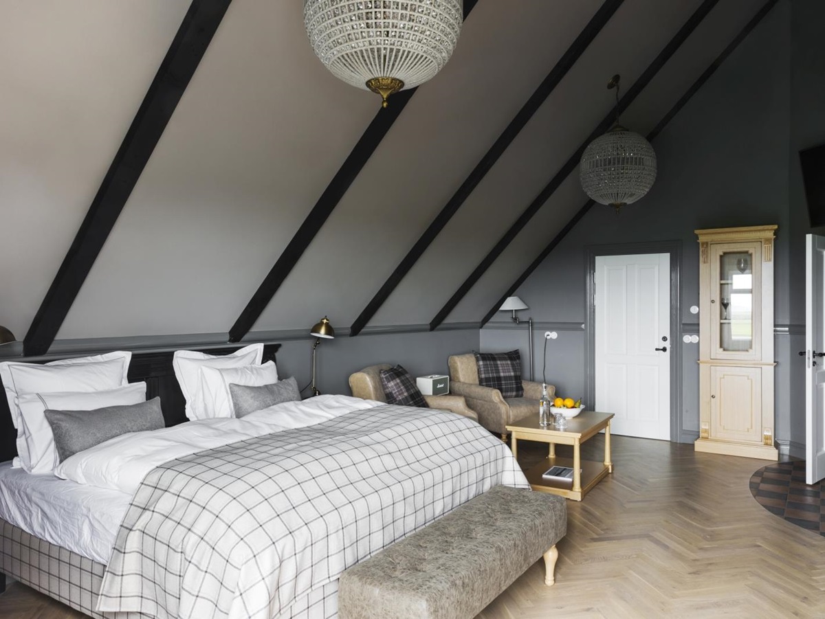 Bed in Master Suite at Skalakot - Boutique hotel in southern Iceland