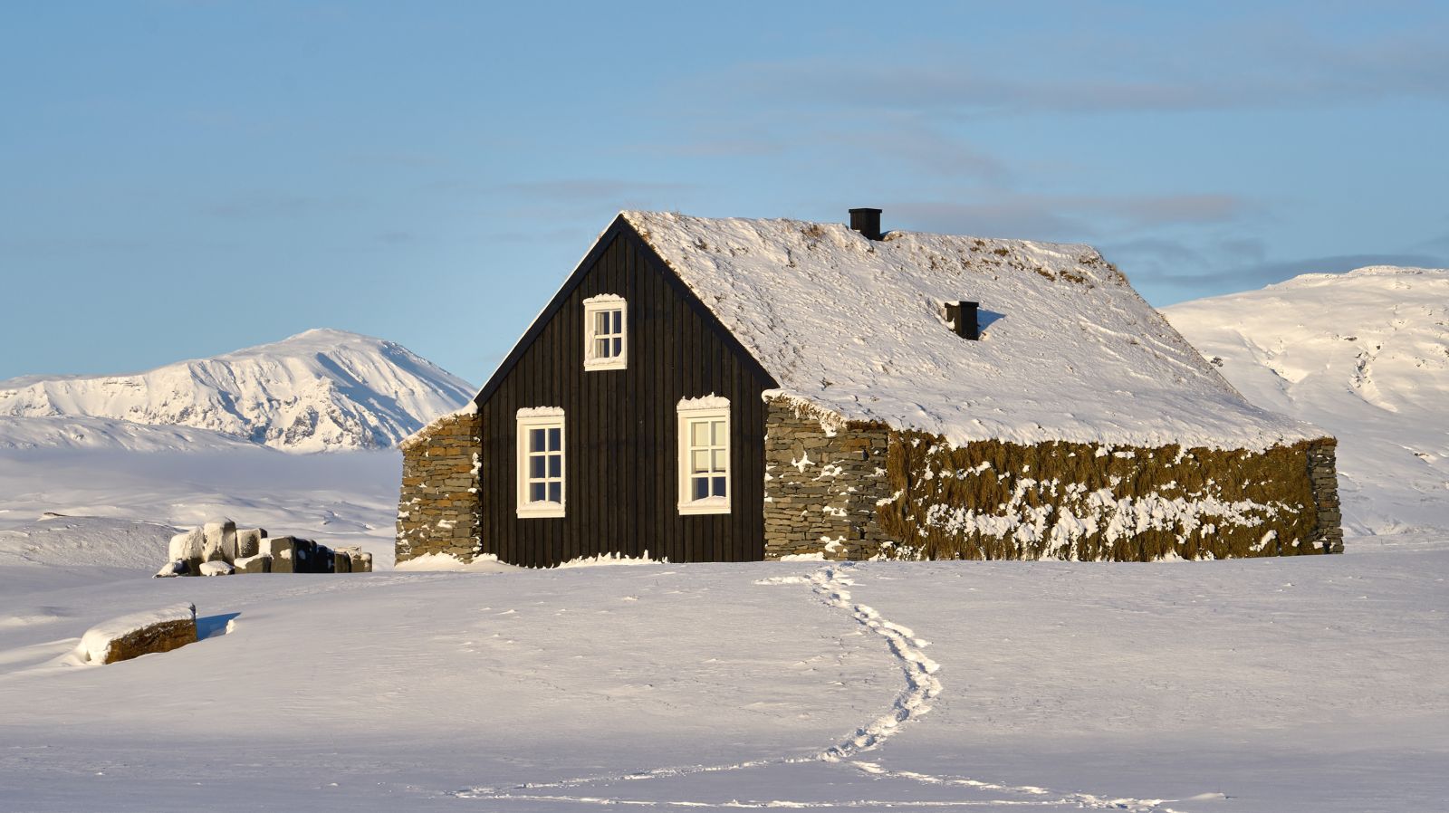 The Torfhus Retreat hotel in Iceland surrounded by thick snow