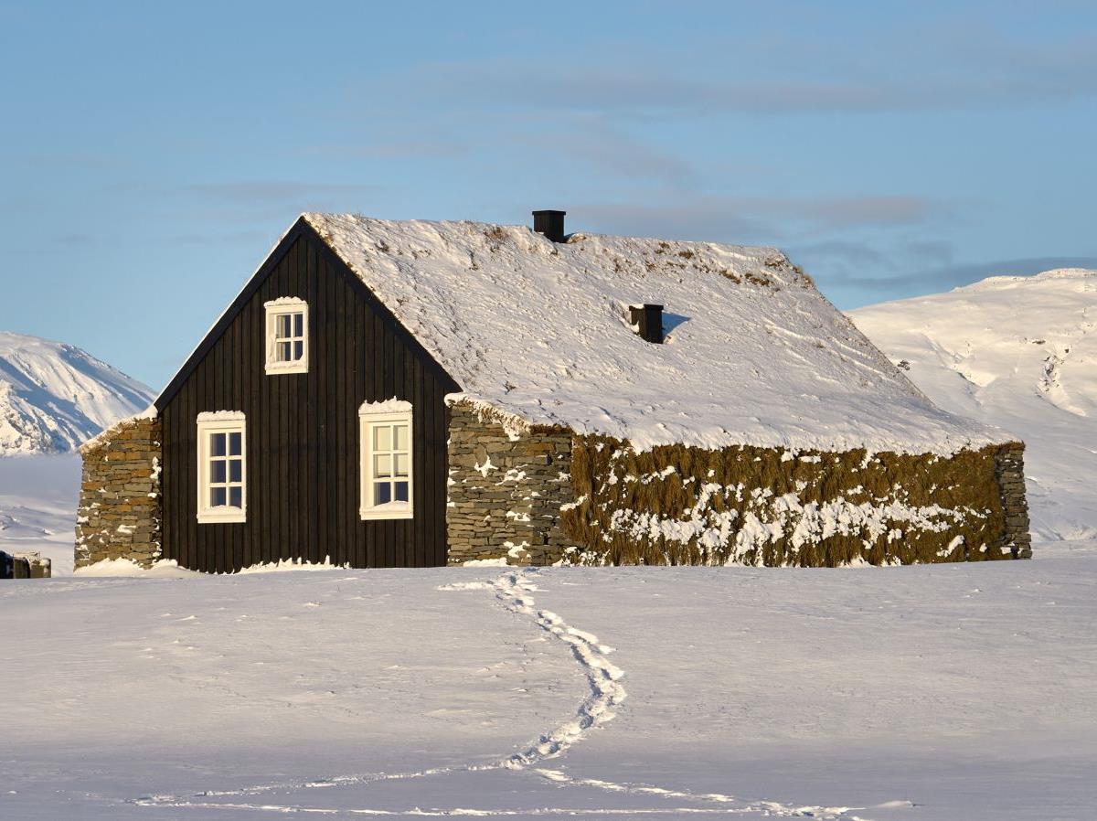 The Torfhus Retreat hotel in Iceland surrounded by thick snow