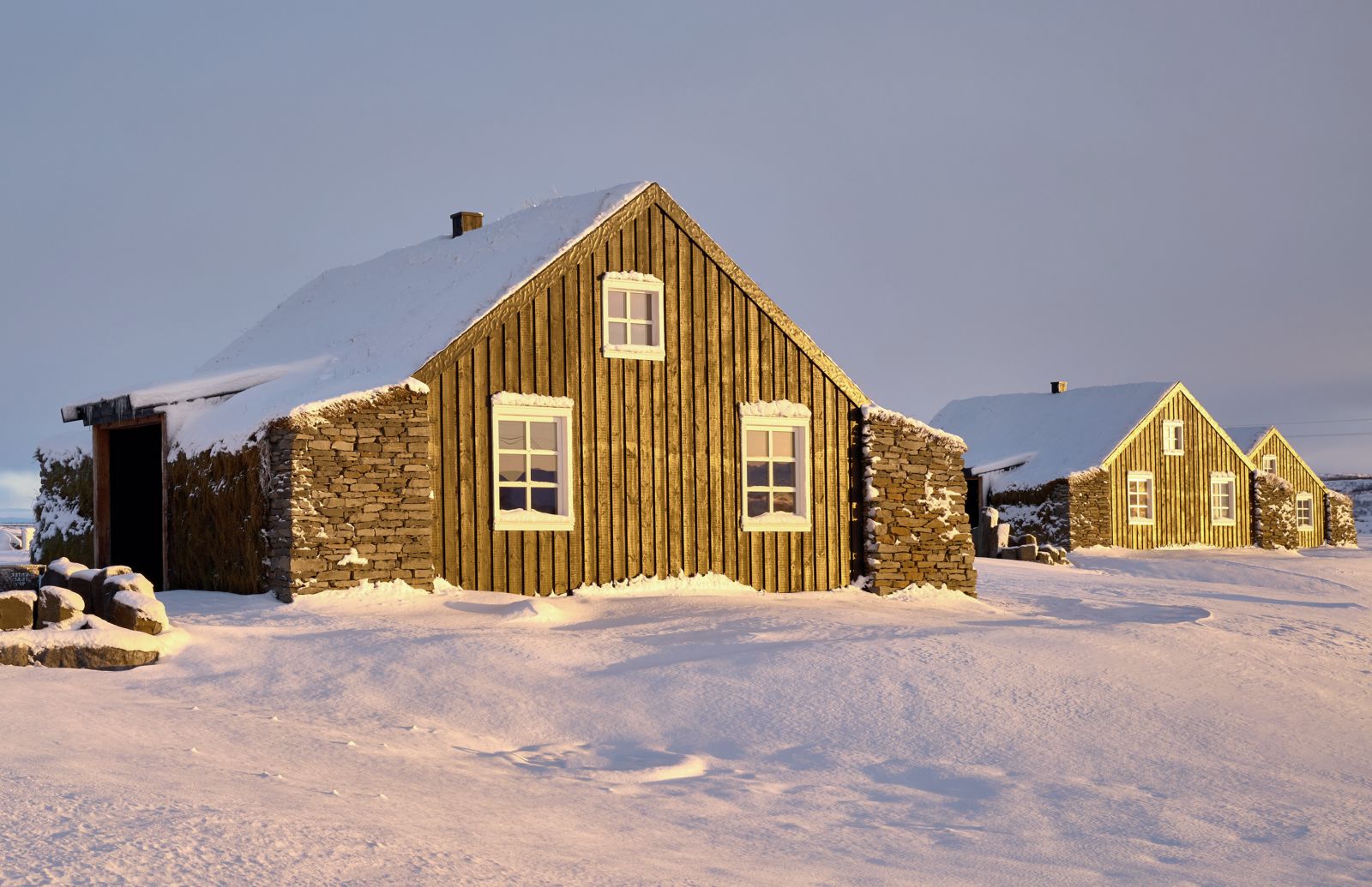 Exterior of the Torfhus Retreat hotel in Iceland during winter