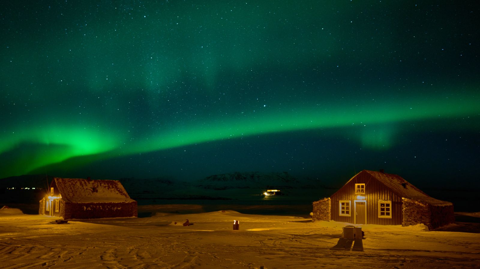 Northern Lights over the Torfhus Retreat hotel in Iceland