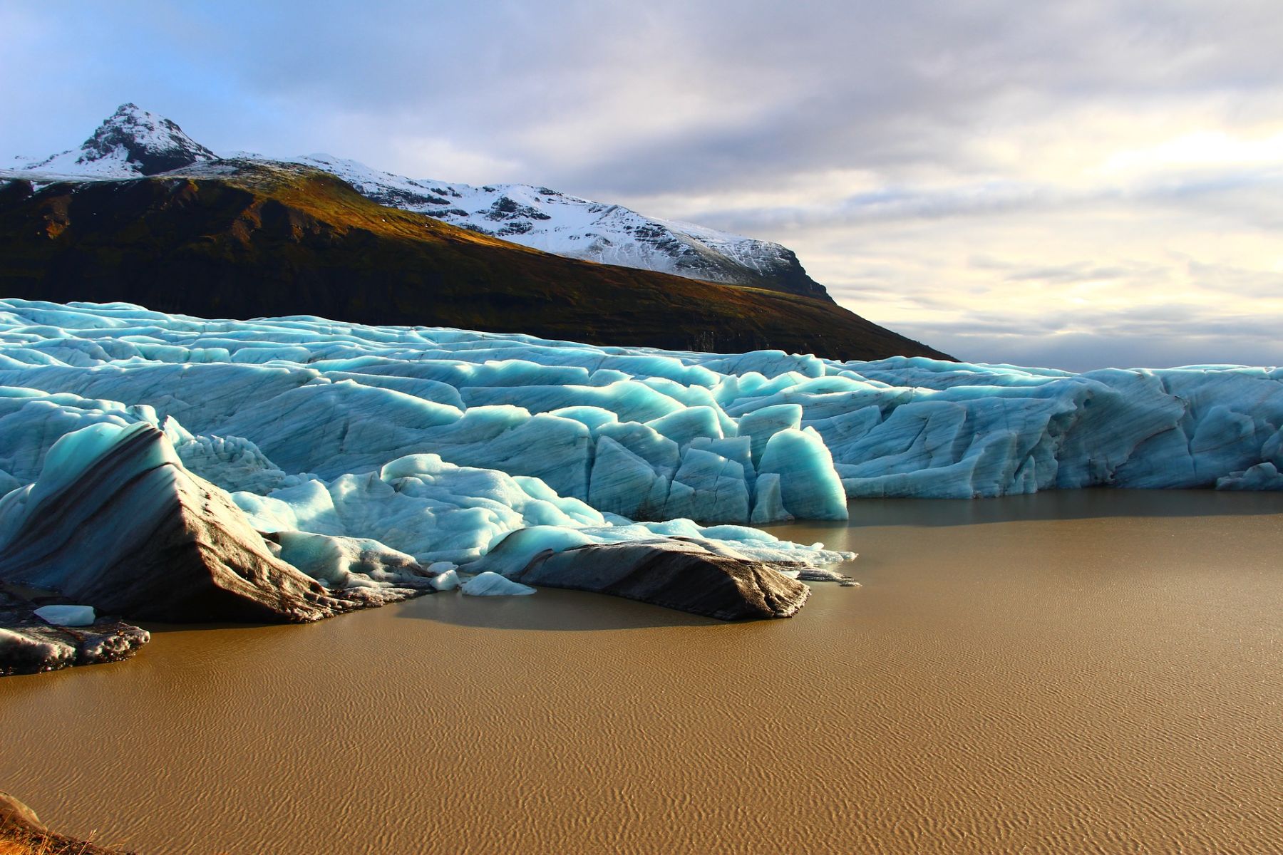 A blue glacier on a lagoon in the Skaftafell National Park in Iceland