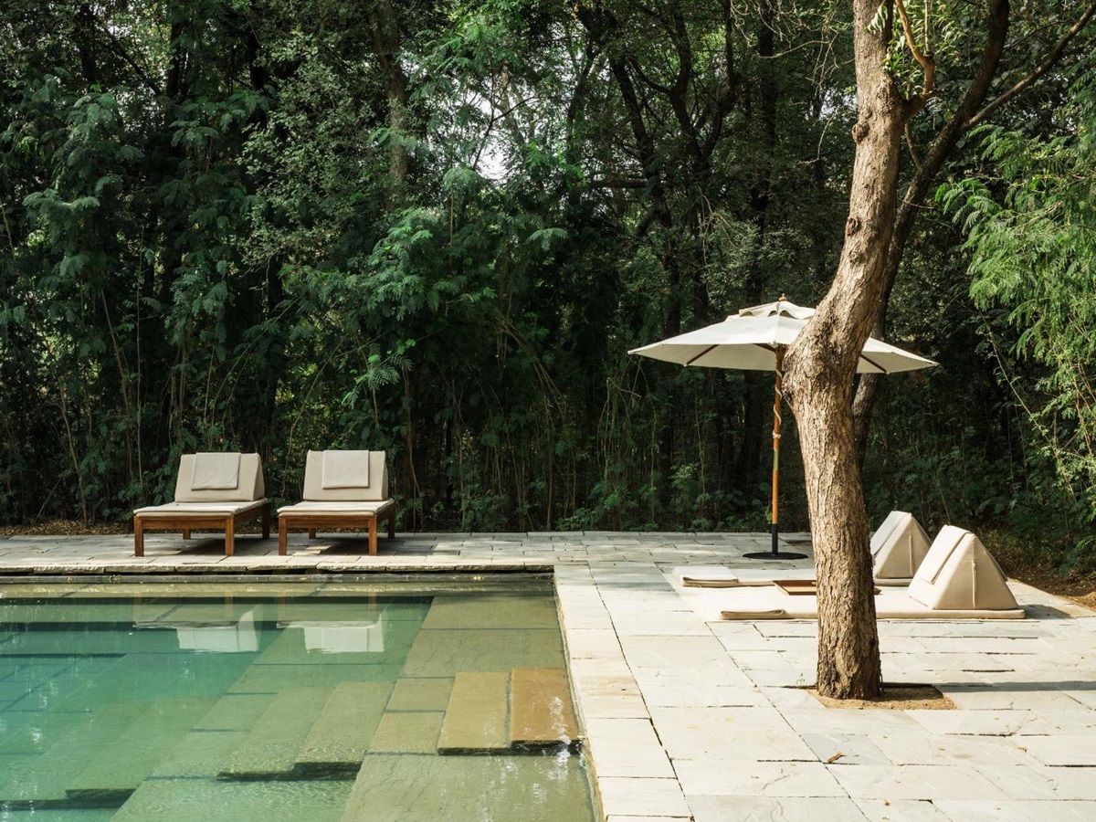 Poolside sunbeds at Aman-I-Khas by Ranthambore National Park in India