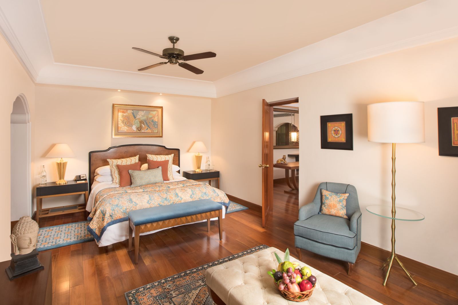 Spacious garden suite bedroom with living space in luxury hotel in India